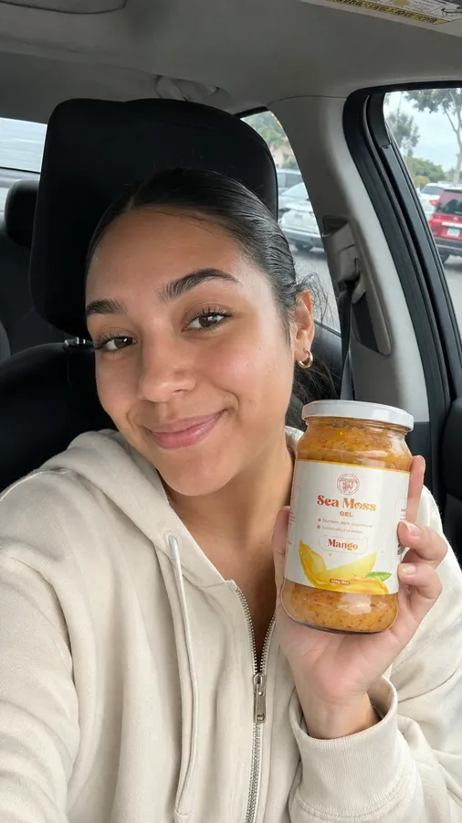 Customer selfie in the car holding Fresh Sea Moss